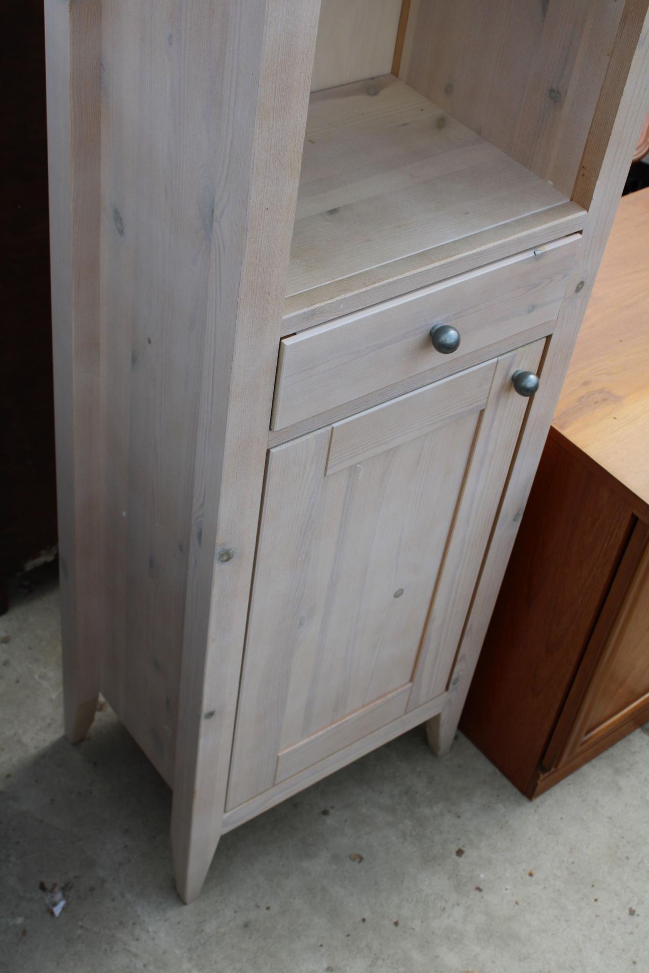 A MODERN PINE LIMED NARROW STORAGE UNIT, 19" WIDE - Image 3 of 3