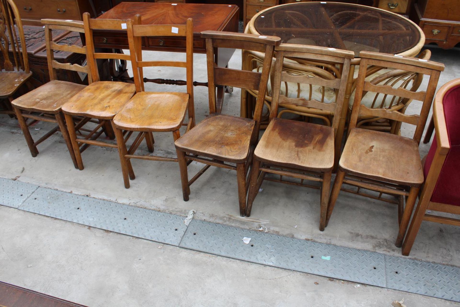 FOUR VARIOUS ELM AND BEECH CHAPEL CHAIRS AND TWO KITCHEN CHAIRS
