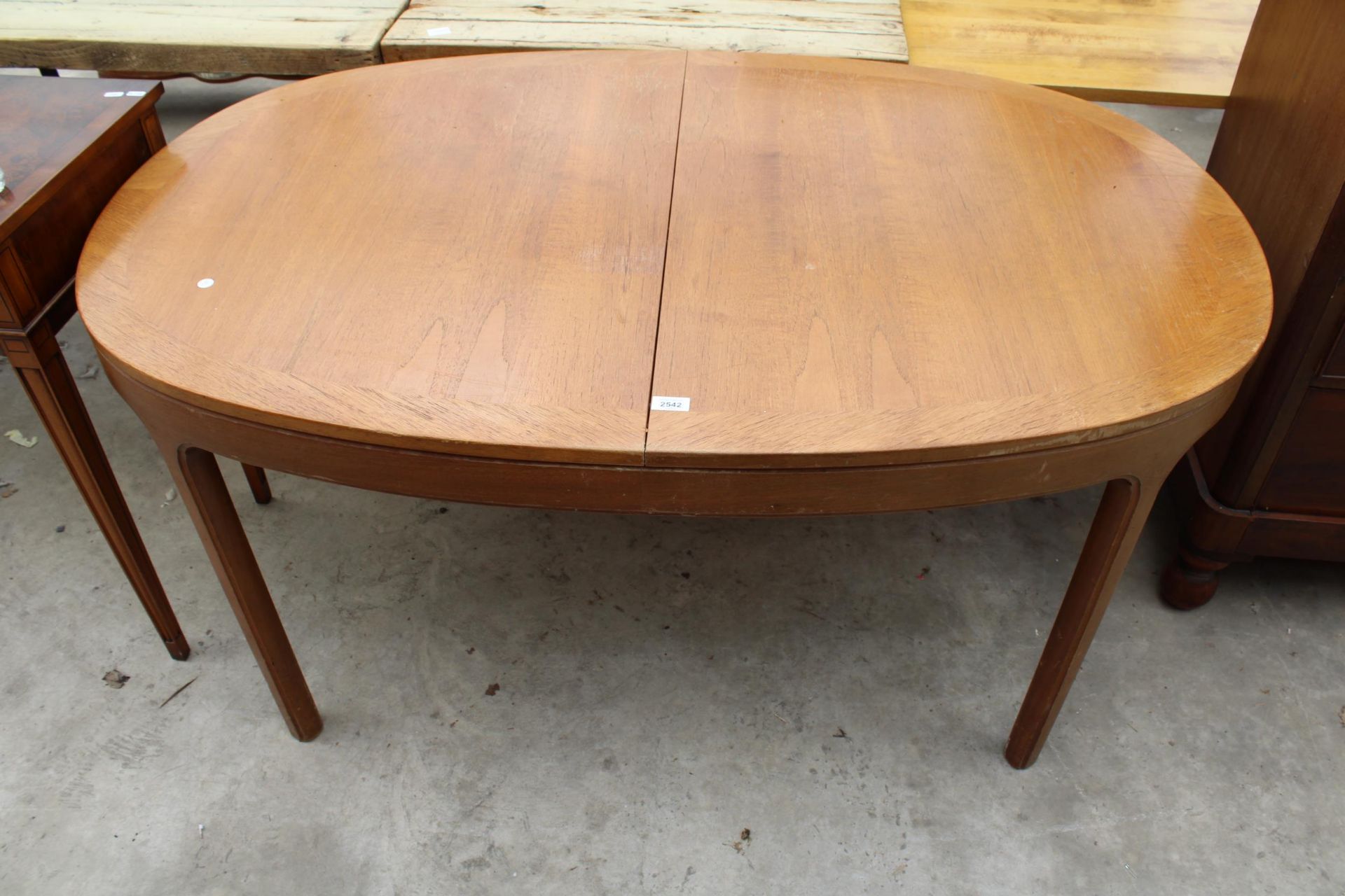A RETRO TEAK AND CROSSBANDED EXTENDING DINING TABLE 60" X 39" (LEAF 21")
