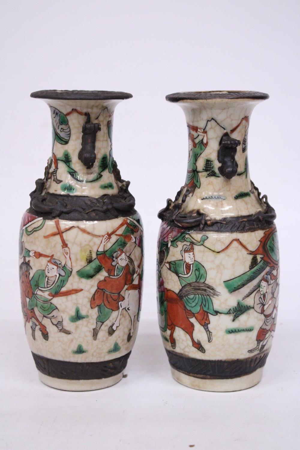 A PAIR OF CHINESE CRACKLE GLAZED VASES WITH WARRIOR SCENES - 18 CM (H) - MARK TO BASE - Image 2 of 6