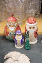 FOUR HANDPAINTED RUSSIAN DOLLS AND A CHRISTMAS TREE ORNAMENT