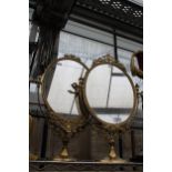 A PAIR OF DECORATIVE BRASS SWING FRAME DRESSING TABLE MIRRORS