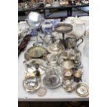 A LARGE QUANTITY OF SILVER PLATED ITEMS TO INCLUDE TEAPOTS, MUFFIN DISHES, PLATES, BOWLS,