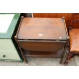 A MID 20TH CENTURY OAK TWO TIER DROP-LEAF TROLLEY