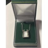 A SILVER NECKLACE WITH A MOTHER OF PEARL AND MARCASITE DECO STYLE PENDANT IN A PRESENTATION BOX