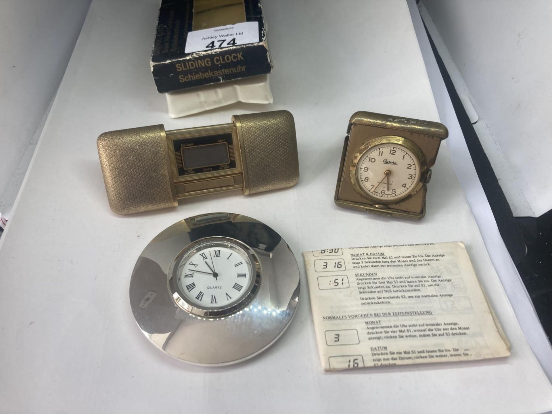 THREE VINTAGE TRAVEL CLOCKS