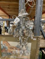 A NEW AND BOXED PAIR OF HANDMADE GREY FRENCH CHANDELIERS