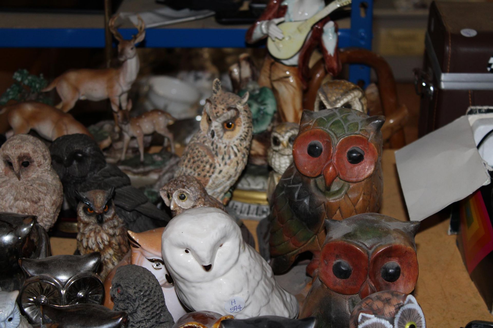 A COLLECTION OF 30+ OWL FIGURES, PLUS A TABLE LAMP WITH A DEER BASE AND A LARGE FIGURE OF A BOY - - Image 5 of 5