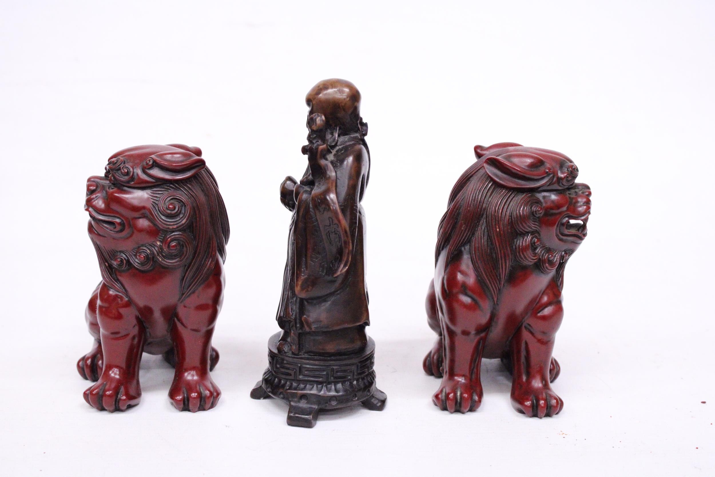 A PAIR OF CHINESE FOO DOGS AND A CHINESE WISEMAN - Image 2 of 4