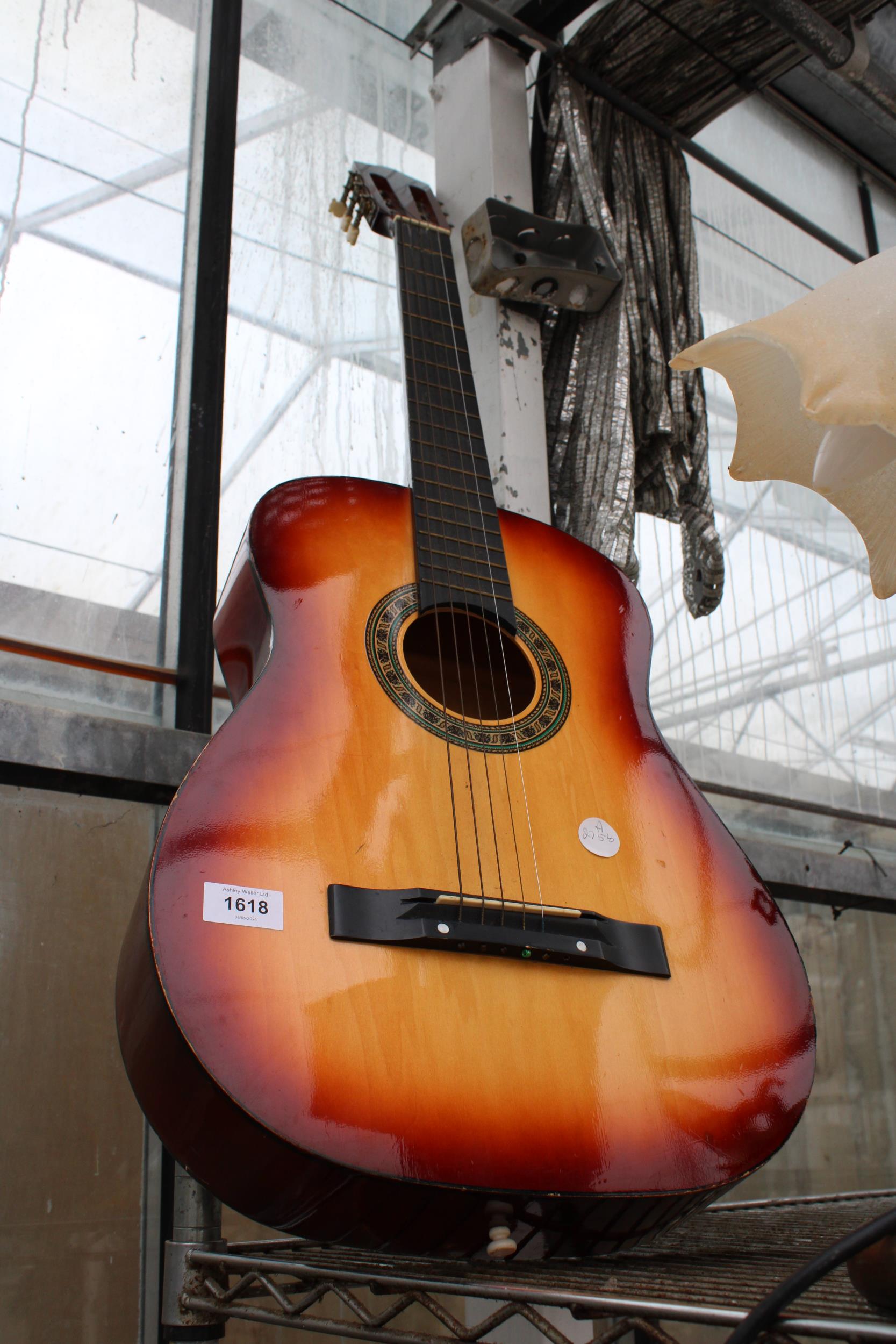 AN ACOUSTIC GUITAR