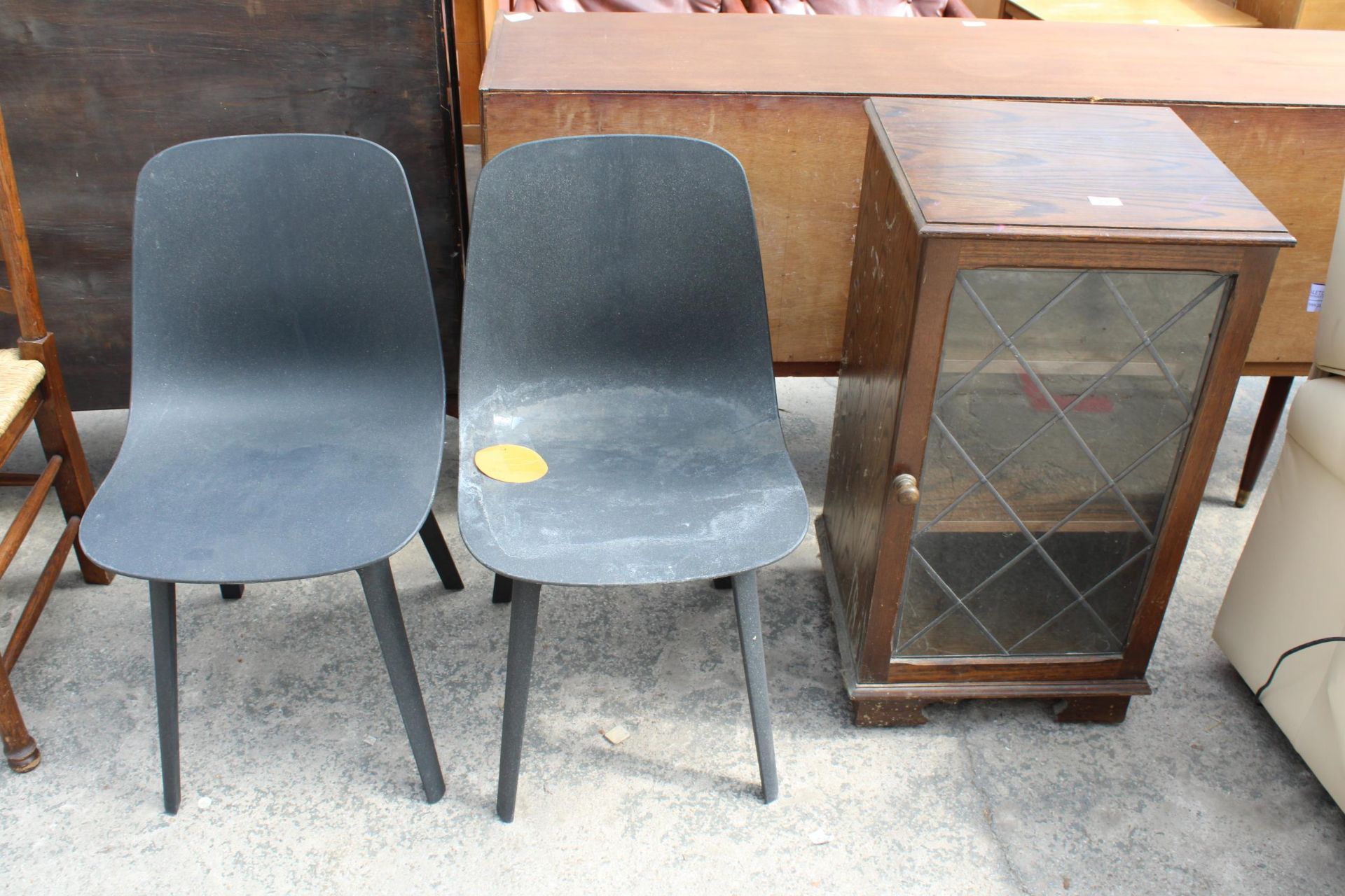 A PAIR OF PLASTIC DINING CHAIRS AND A HI-FI CABINET