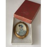 A 1940'S HAND PAINTED BROOCH IN A PRESENTATION BOX