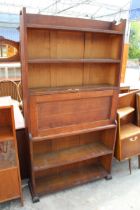 AN EARLY 20TH CENTURY OAK BUREAU BOOKCASE, 39" WIDE