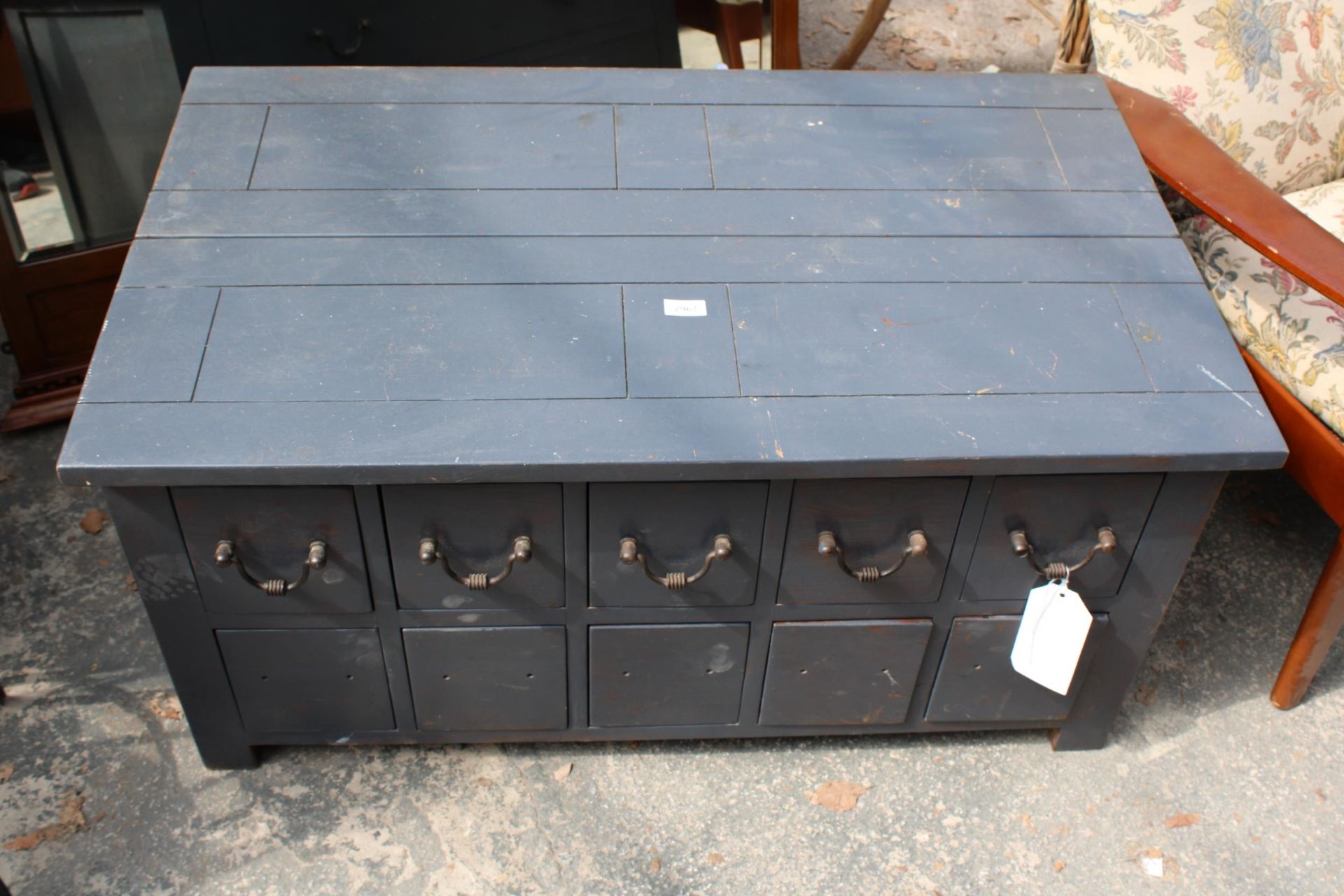 A MODERN PAINTED COFFEE TABLE/CHEST ENCLOSING TEN DRAWERS AND TWO SHAM DRAWERS, 41" X 24"