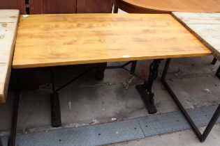 A WOODEN PUB TABLE ON CAST IRON BASE, 48" X 24"