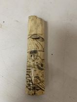 A POSSIBLE BONE HOLDER FOR A DAGGER WITH ORIENTAL CARVING