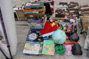 AN ASSORTMENT OF TOYS AND GAMES TO INCLUDE JIGSAW PUZZLES, MASKS AND BUILDING BLOCKS ETC