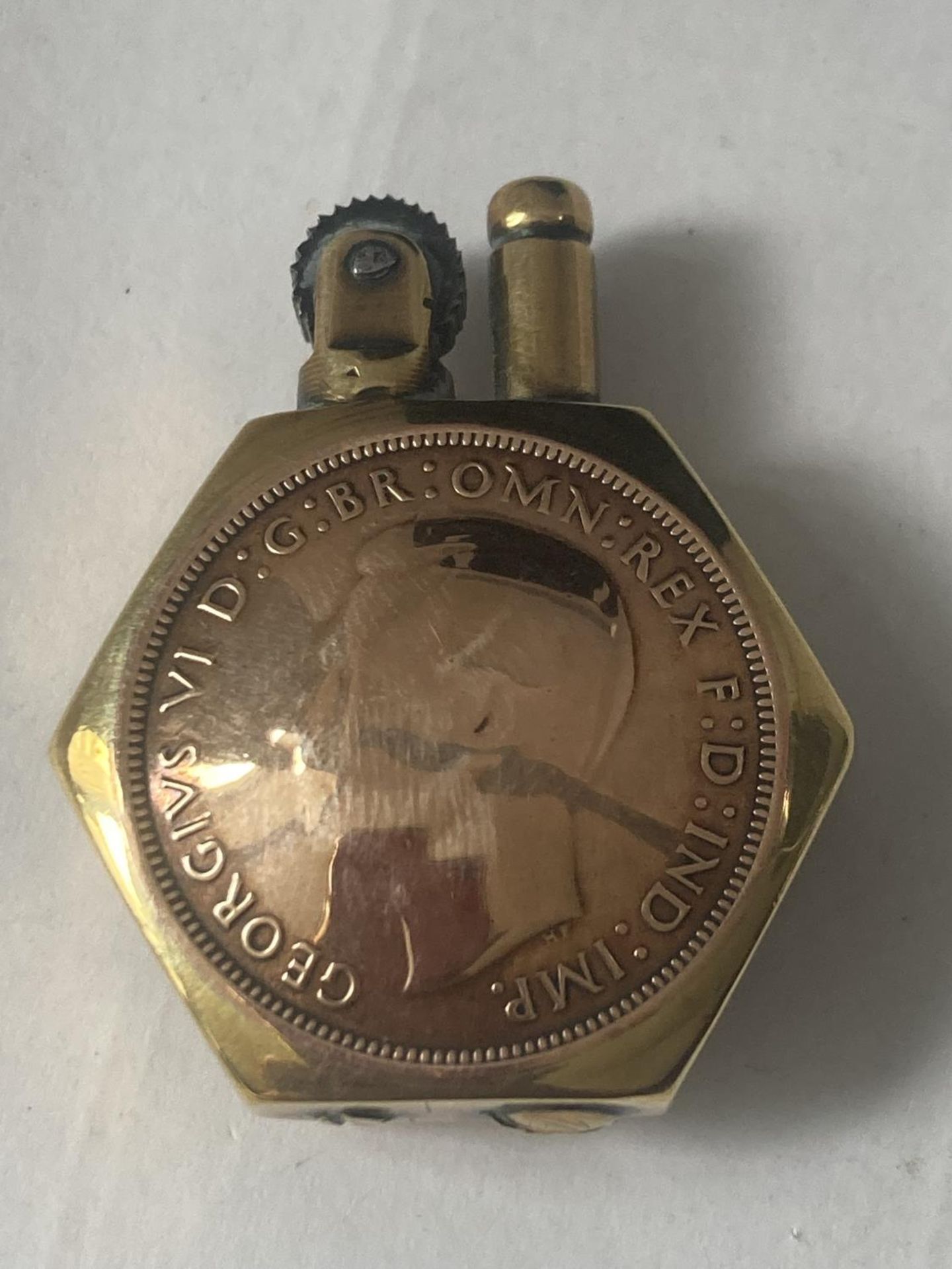 A 1937 ONE PENNY TRENCH ART LIGHTER