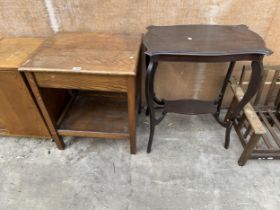 AN EDWARDIAN CENTRE TABLE AND AN OAK TWO TIER TABLE