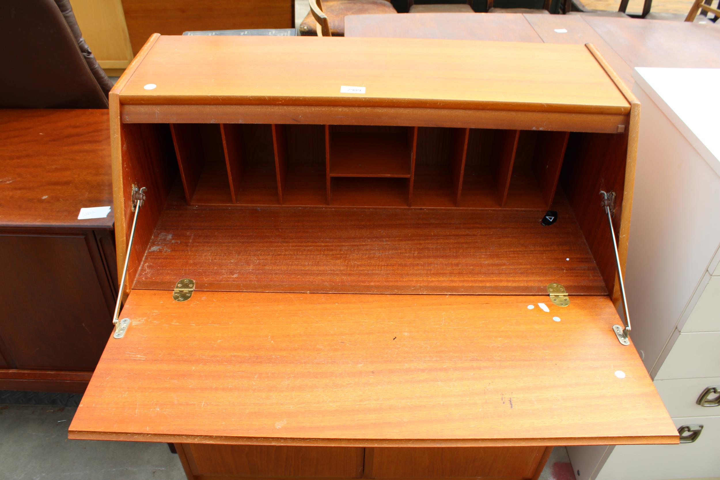 A RETRO TEAK BUREAU WITH CUPBOARDS AND SINGLE DRAWER TO BASE, 33" WIDE - Image 2 of 3