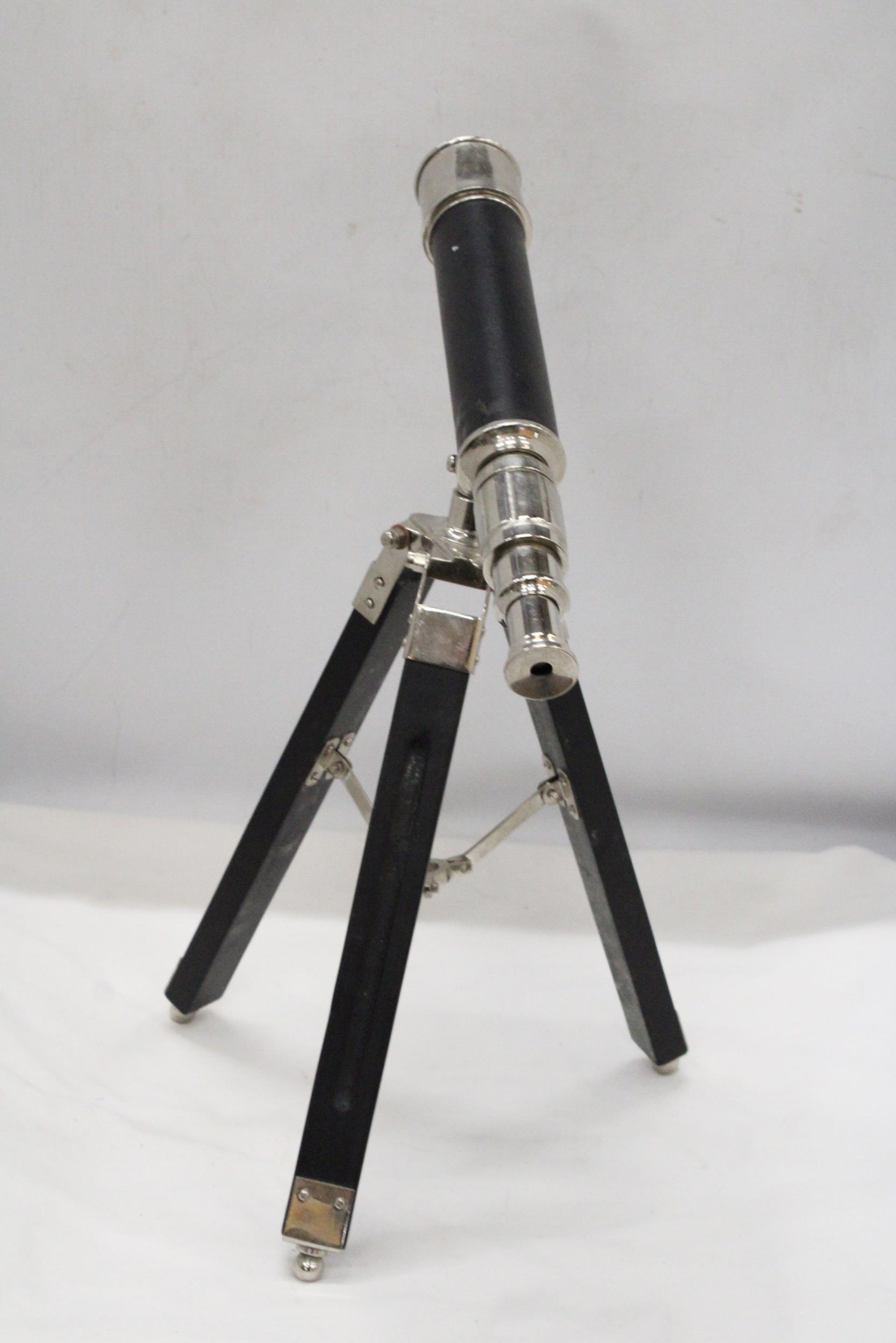 A CHROME TELESCOPE WITH TRIPOD STAND - Image 4 of 4