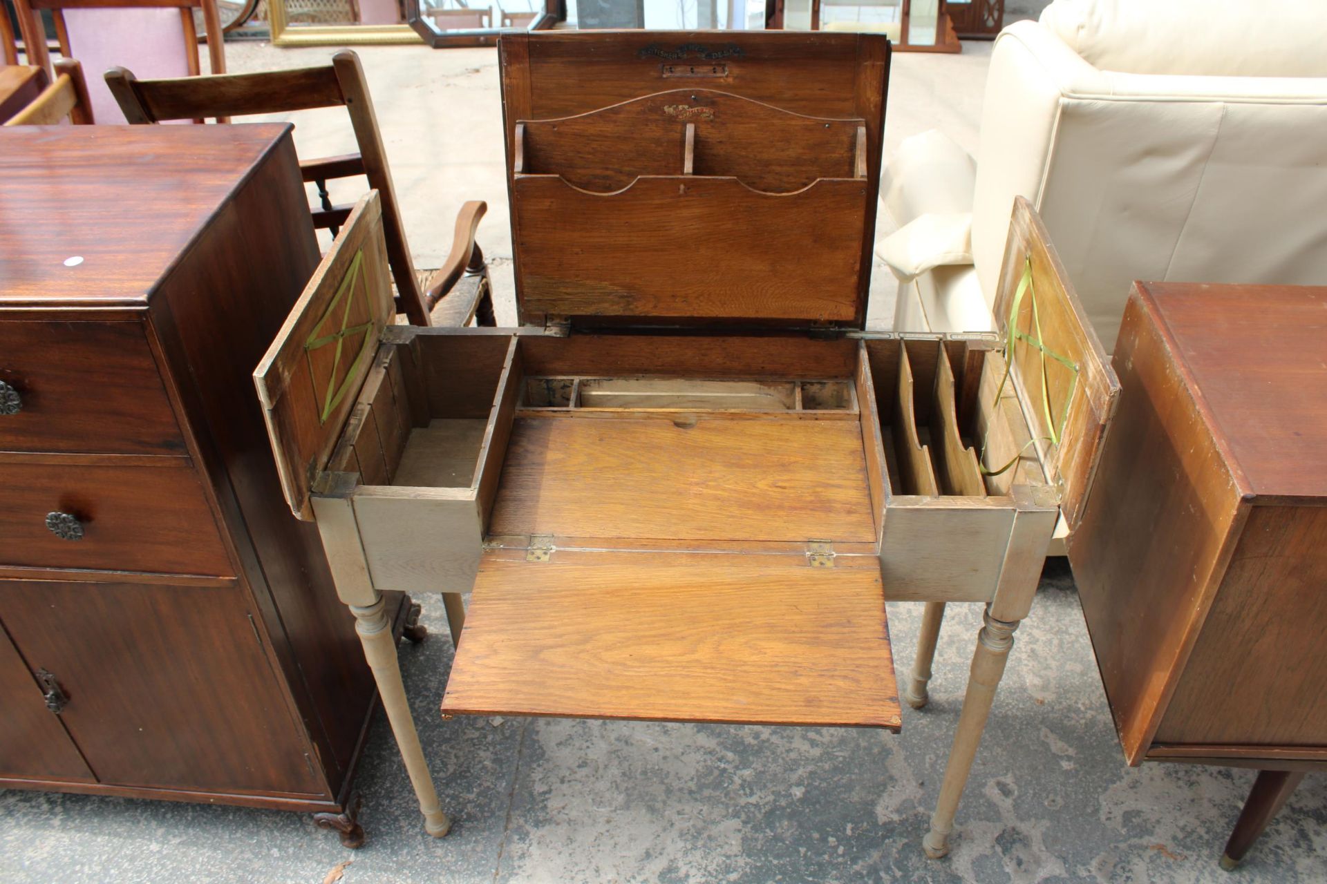 AN EARLY 20TH CENTURY OAK 'THE BRITISHER DESK' WITH FOLD-OUT WRITING AND STORAGE SECTIONS, 36" WIDE - Image 2 of 6