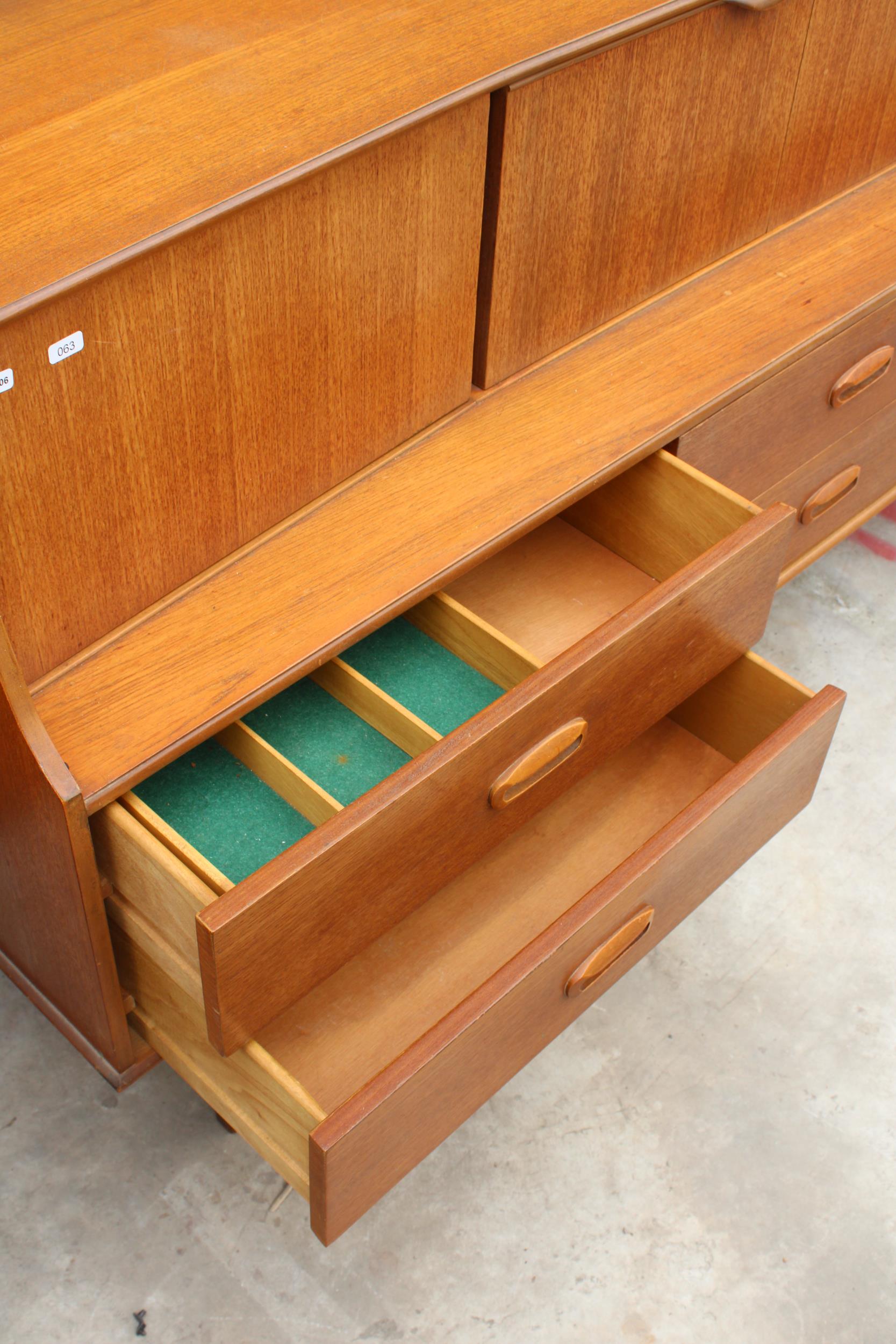 A RETRO TEAK PORTWOOD FURNITURE SIDEBOARD ENCLOSING SIX DRAWERS AND FOUR CUPBOARDS, 72" WIDE - Image 3 of 4
