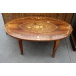 AN OVAL ITALIAN MARQUETRY COFFEE TABLE