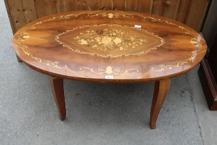 AN OVAL ITALIAN MARQUETRY COFFEE TABLE