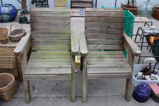 A PAIR OF LARGE WOODEN GARDEN CHAIRS