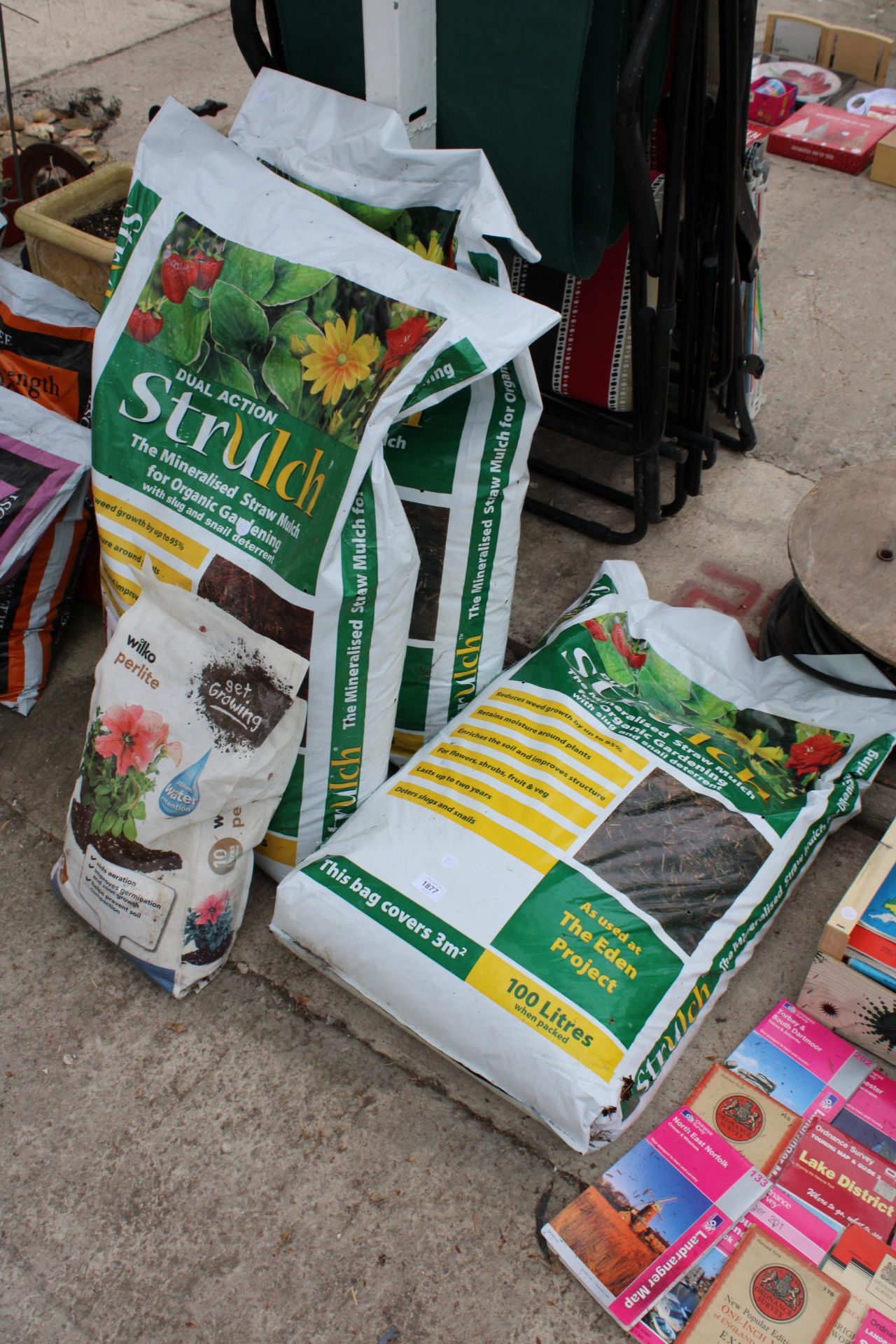 THREE BAGS OF STRULCH STRAW MULCH AND A BAG OF WATER RETENTION GRANUALES