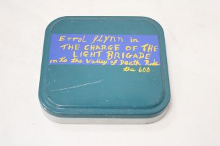 A RARE TINNED TAPE OF ERROL FLYNN IN 'THE CHARGE OF THE LIGHT BRIGADE'