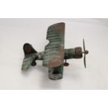 A U.S.A TIN PLATE BI-PLANE APPROXIMATELY 13CM HIGH BY 23CM LONG