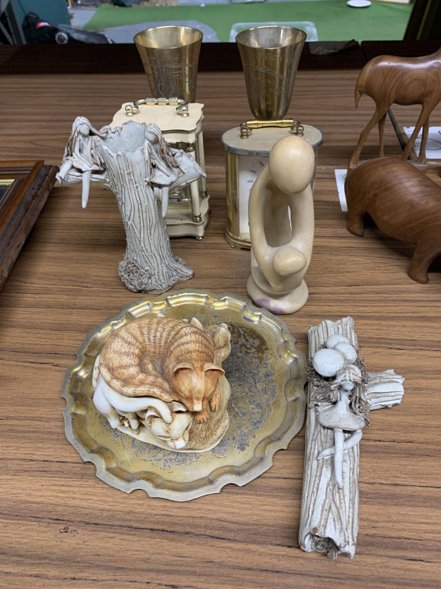 TWO CARRIAGE CLOCKS, A PAIR OF BRASS GOBLETS AND PLATE, A CAT FIGURE, ETC