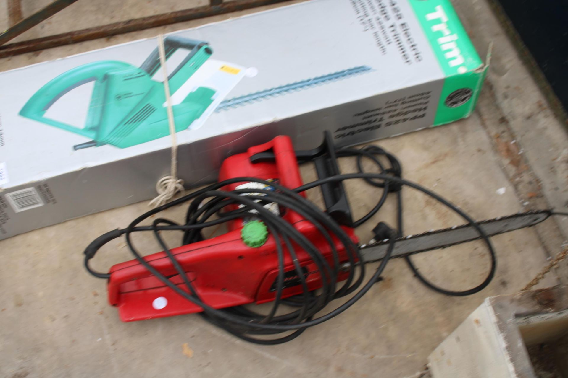 A CHAMPION ELECTRIC CHAINSAW AND AN ELECTRIC HEDGE TRIMMER - Image 2 of 2