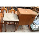 A TEAK EFFECT SEWING MACHINE CABINET AND OCCASIONAL TABLE