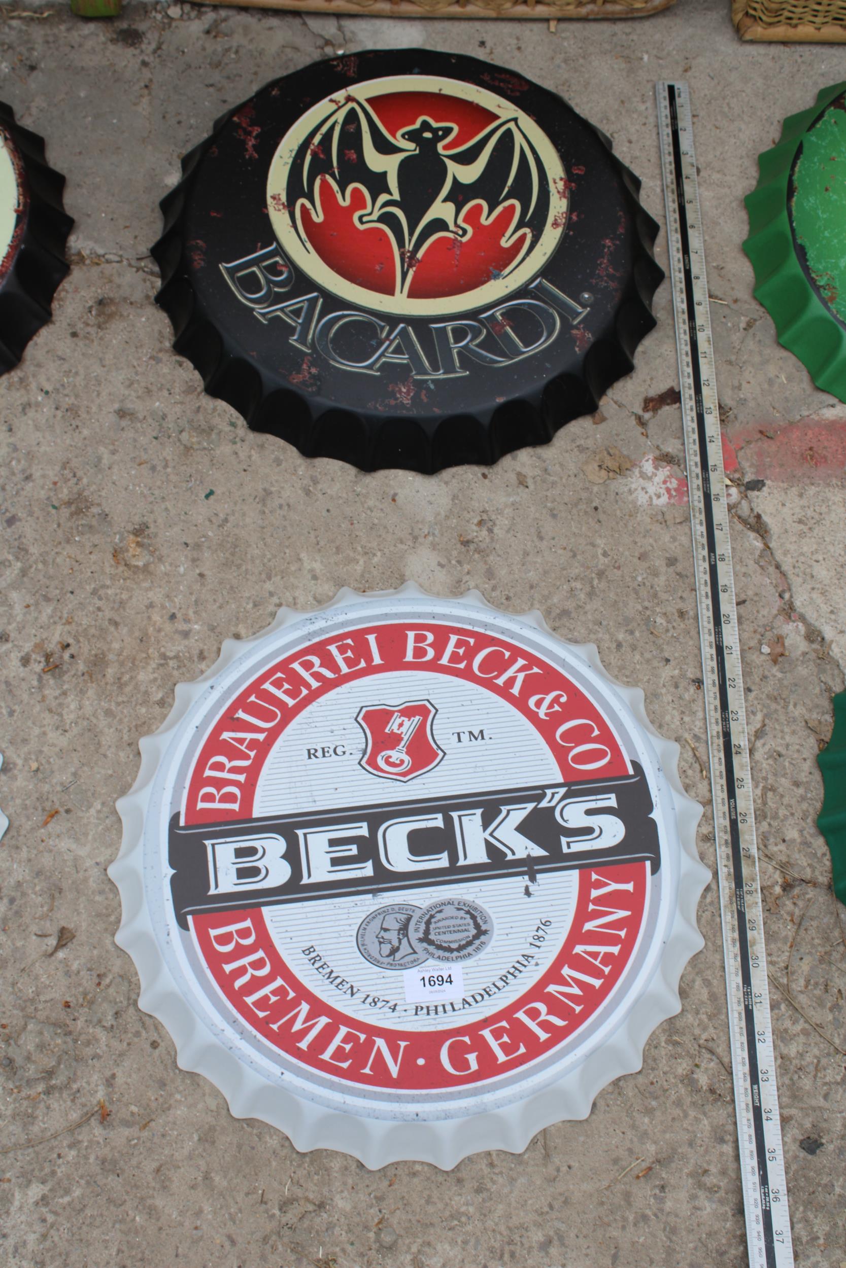 TWO BOTTLE CAP STYLE SIGNS TO INCLUDE BACARDI ETC