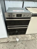 A CHROME AND BLACK BAUMATIC INTERGRATED DOUBLE OVEN