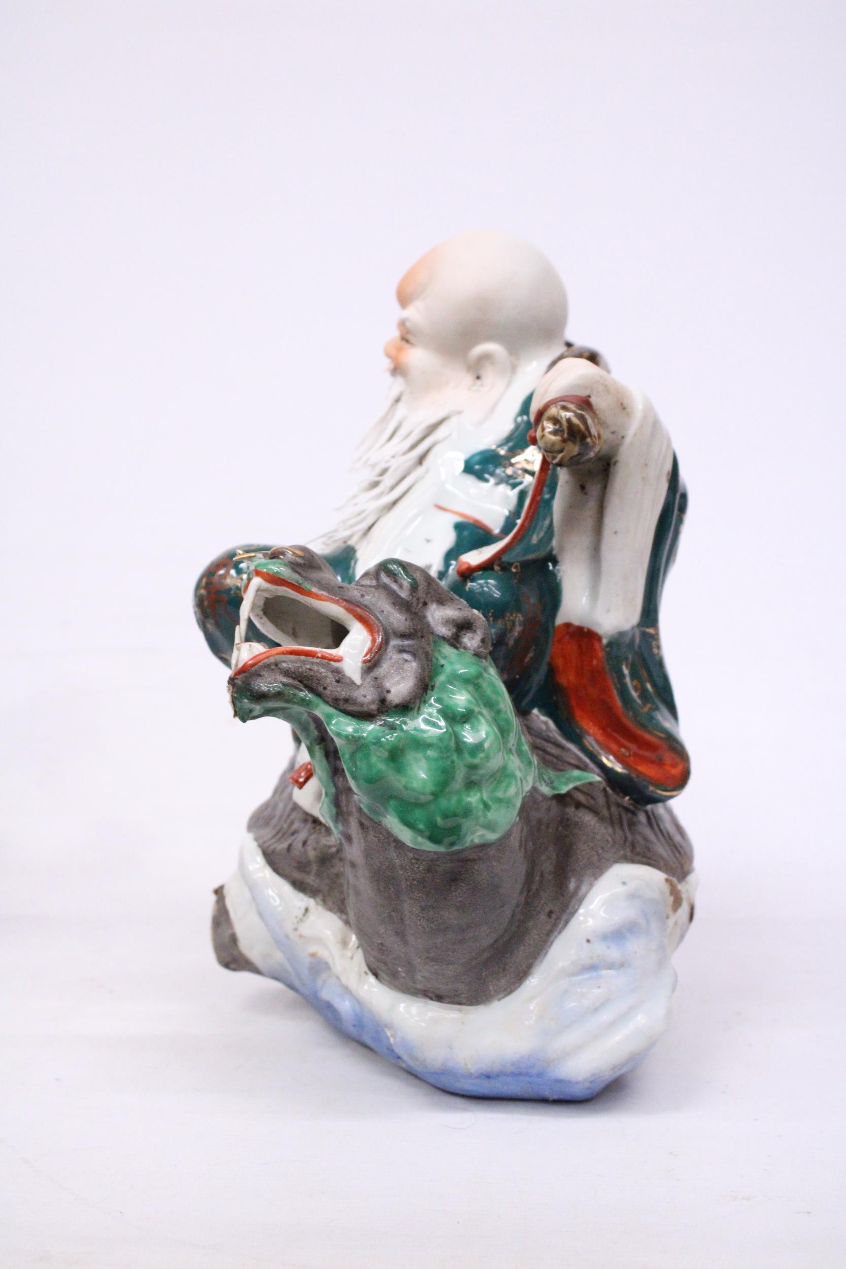 A CHINESE PORCELAIN WISE MAN RIDING A DRAGON TURTLE - Image 3 of 7