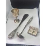 FOUR POSSIBLY SILVER ITEMS TO INCLUDE A GOBLET, LADLE, PILL BOX AND SHOE HORN