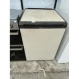 A BROWN AND CREAM HOTPOINT UNDER COUNTER FREEZER