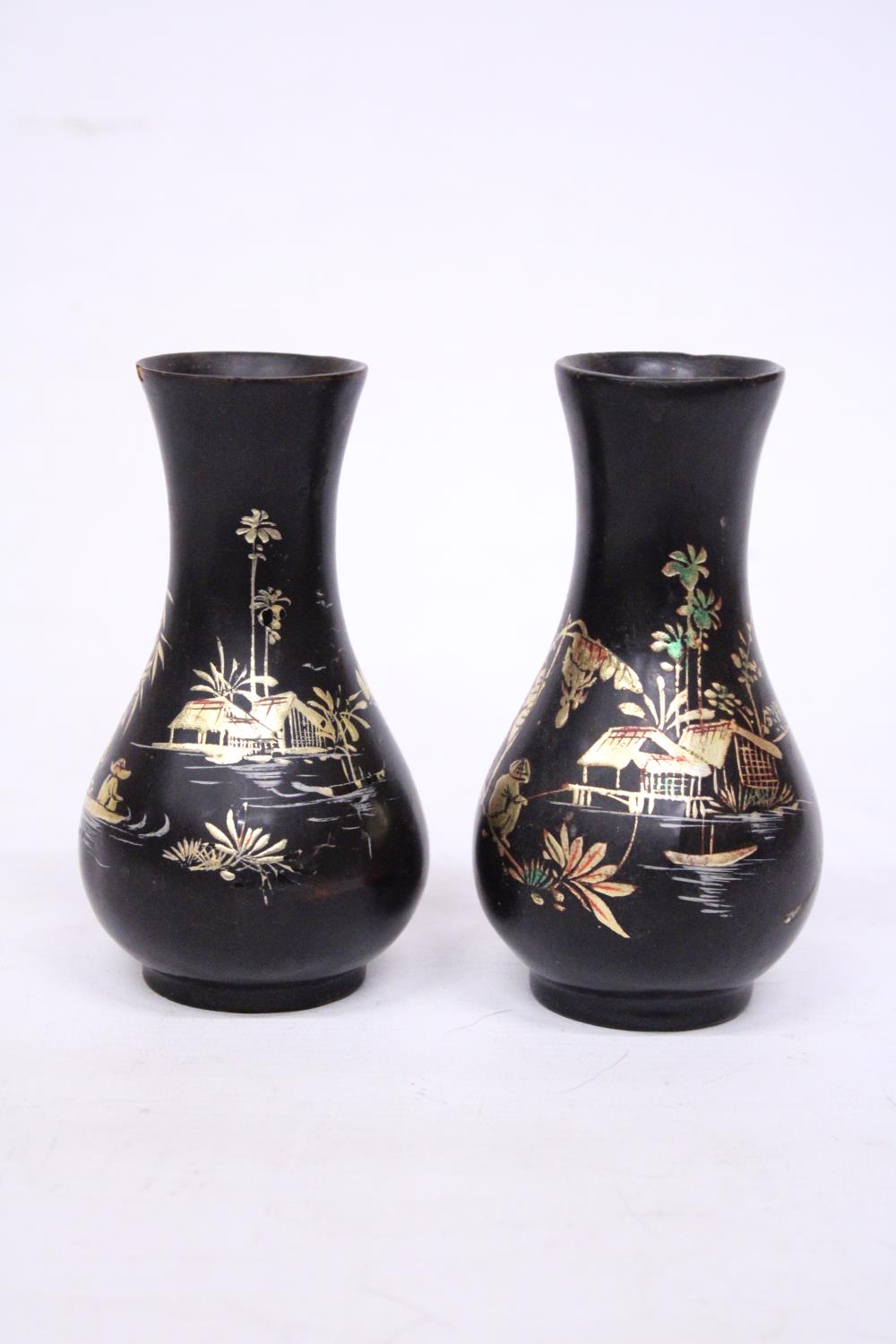 A PAIR OF FOOTED WOODEN LACQUER VASES WITH ORIENTAL SCENES - 14 CM (H)