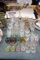 A LARGE QUANTIOTY OF GLASSES TO INCLUDE WINE, SHERRY, PORT, SPIRITS, TANKARDS, ETC