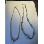 TWO SILVER NECKLACES