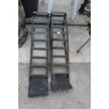 A PAIR OF METAL CAR RAMPS