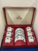 A SET OF SIX SPODE CUPS AND SAUCERS FLEUR DE LYS RED IN A PRESENTATION BOX