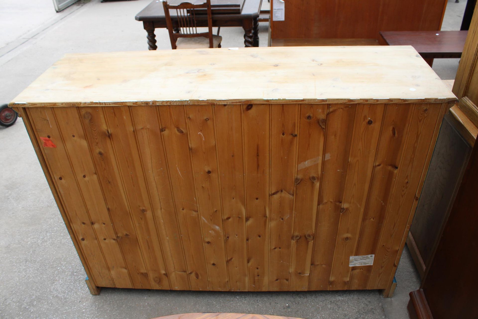 A PINE CHEST OF THREE SHORT AND FOUR LONG DRAWERS, 56" WIDE - Image 7 of 7