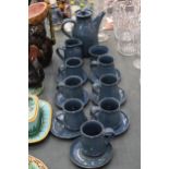 A VINTAGE STUDIO POTTERY TEA SET TO INCLUDE A JUG, SUGAR BOWL, TEAPOT AND EIGHT CUPS AND SAUCERS