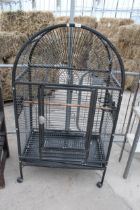 A LARGE METAL PARROT CAGE