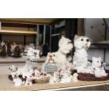 A LARGE COLLECTION OF RESIN WESTIE DOG FIGURES